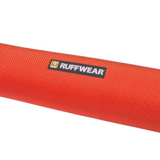 Red dog toy with Ruffwear logo on a white background