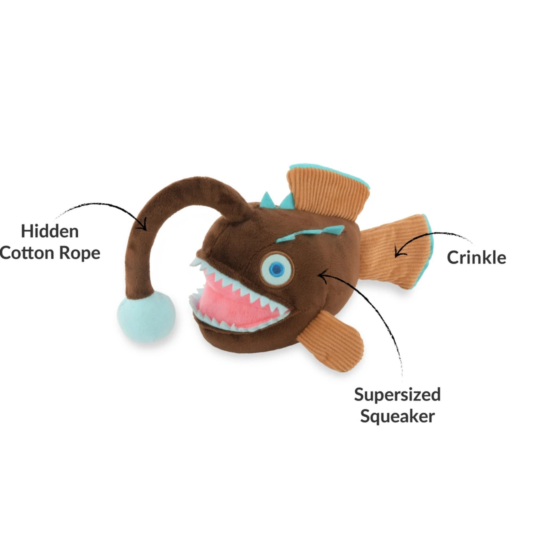 Plush fish toy with features labeled on a white background