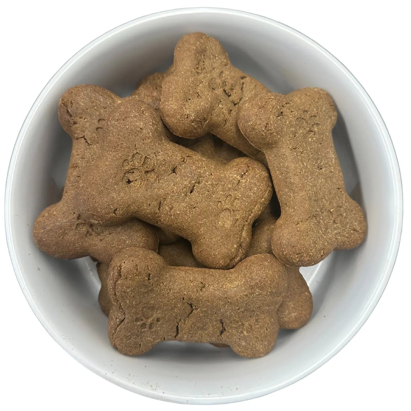 Dog bone-shaped cookies in a white bowl on a white background