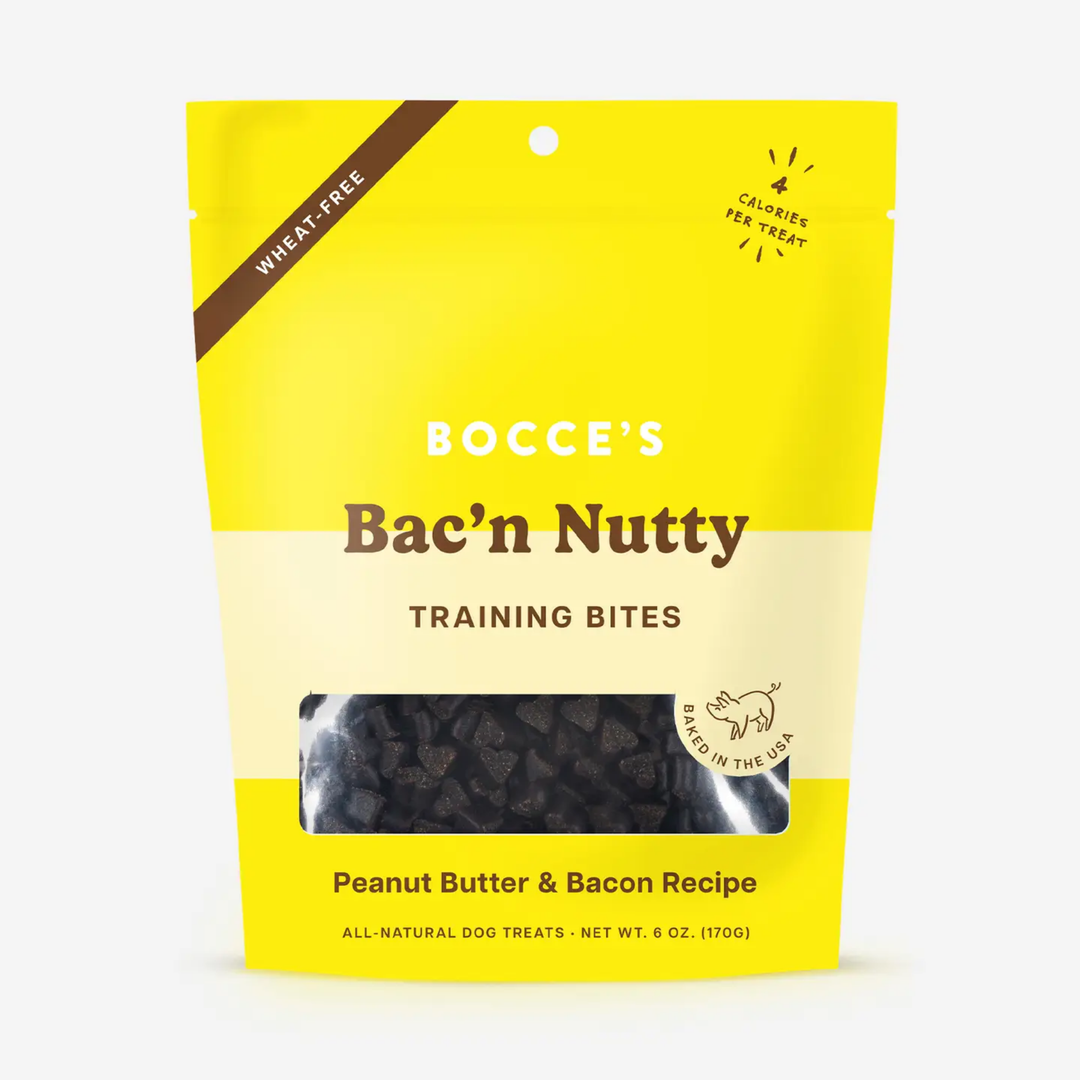Yellow package of Bocce's Bac'n Nutty Training Bites with a clear window showing treats inside.