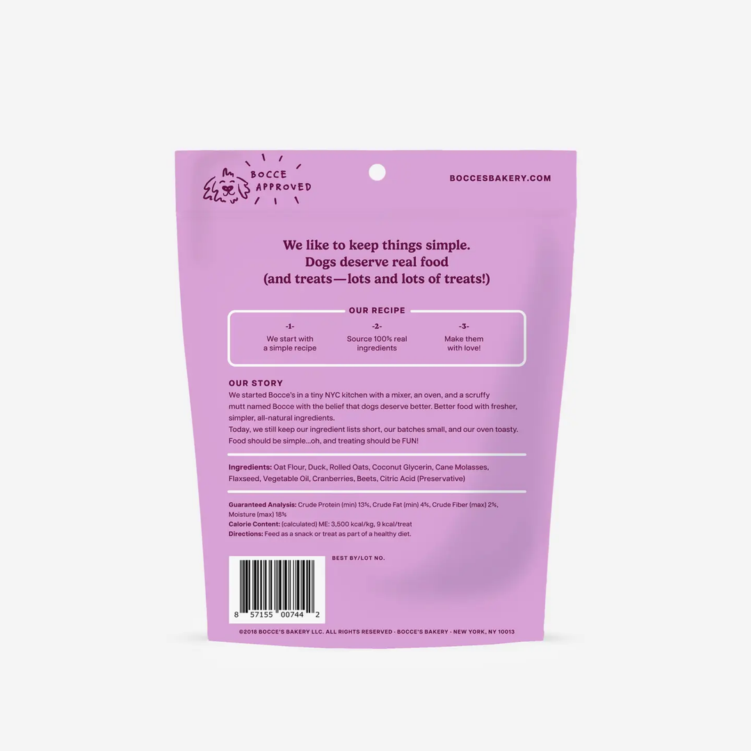 Purple bag of Bocce Bakery dog treats with text and branding on a white background