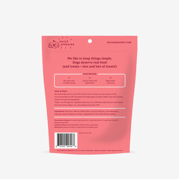 Back of a bocces pink dog treat package with text and branding on a white background