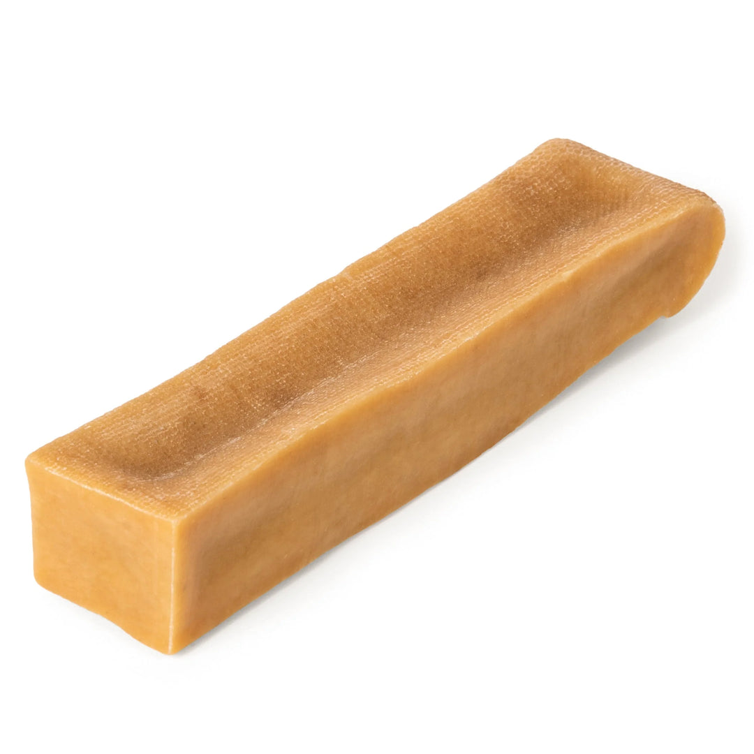 Small Himalayan yakecheese chew stacked on a white background