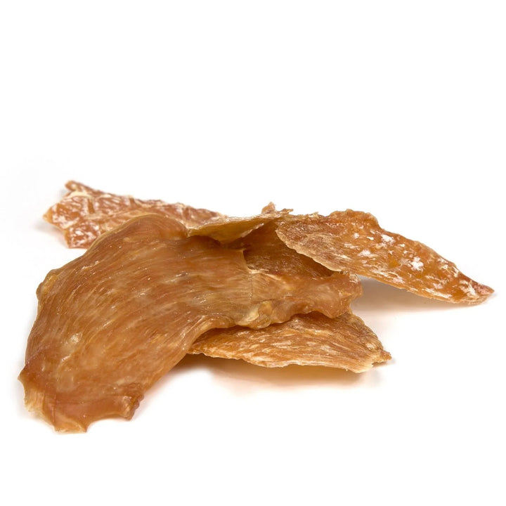Dried ginger root on a white background