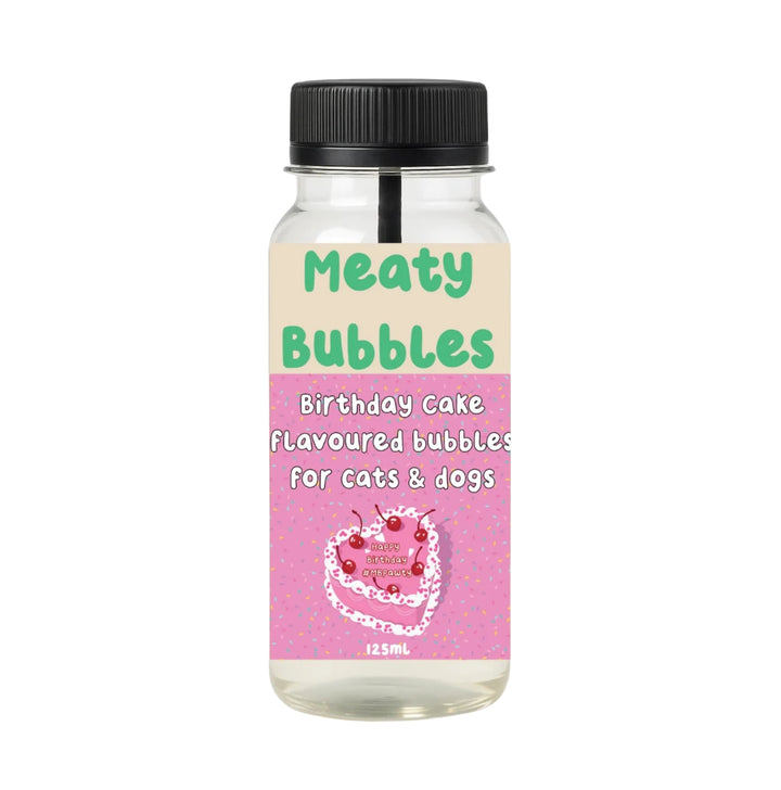 Bottle of 'Meaty Bubbles' birthday cake flavored bubbles for cats and dogs on a white background