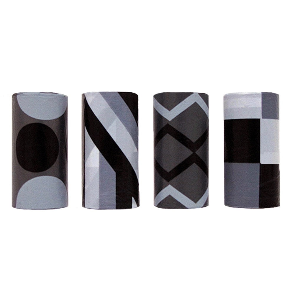 Four cylindrical containers with geometric patterned designs on a white background