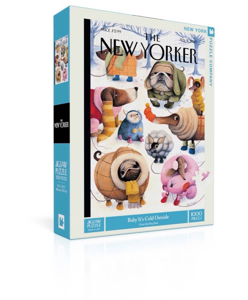 New York Puzzle Company Baby It’s Cold Outside 1000 piece jigsaw puzzle box featuring bundled-up dogs in a snowy winter scene.