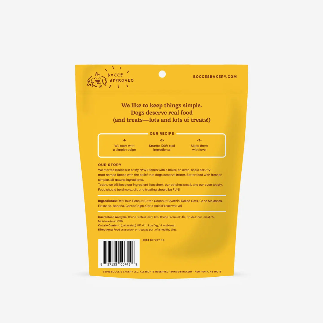 Yellow dog treat package with text and branding on a white background
