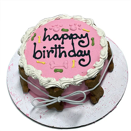 Pink birthday cake with 'happy birthday' text on a white background