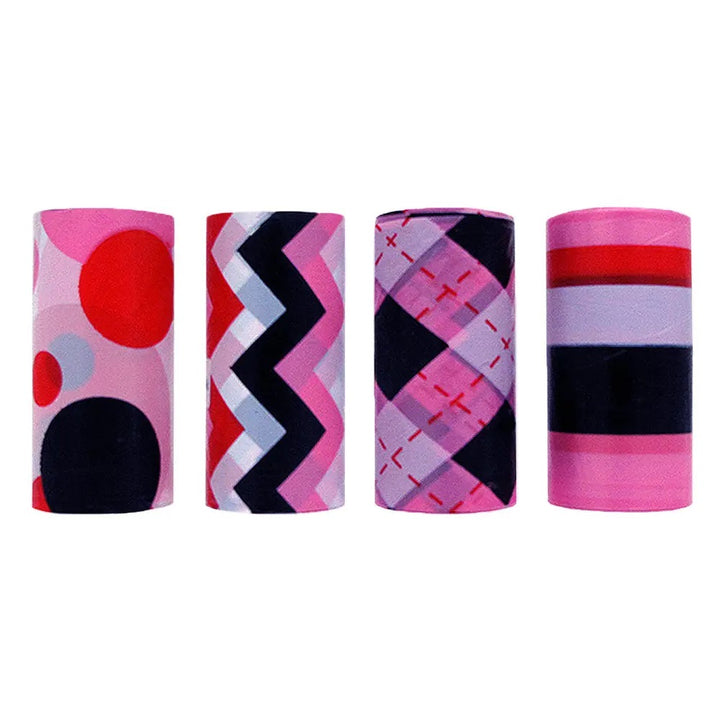 Four cylindrical pink accessories with different geometric patterns, including polka dots, chevron, argyle, and stripes, arranged in a row on a white background.