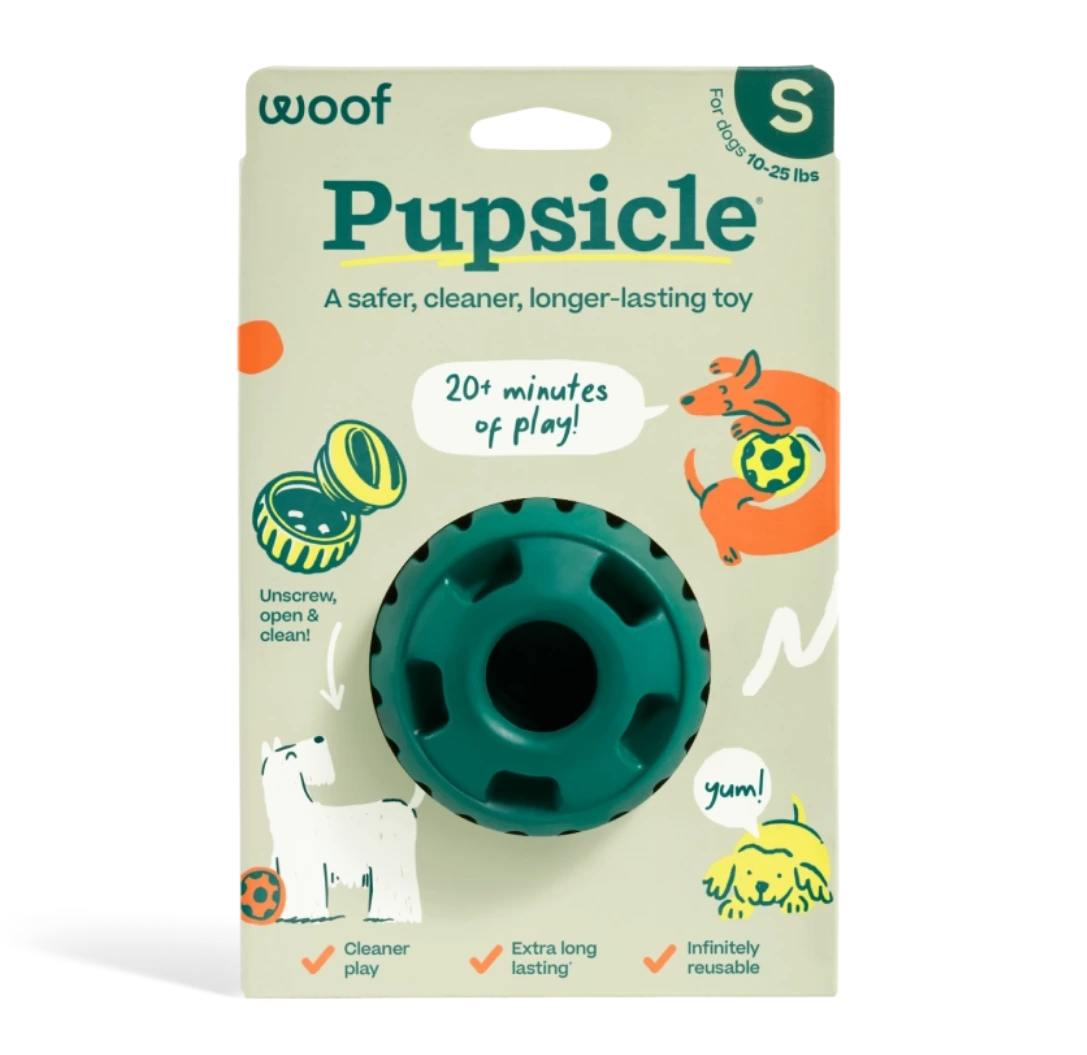 Pupsicle dog toy packaging with green toy and 'woof' branding on a white background