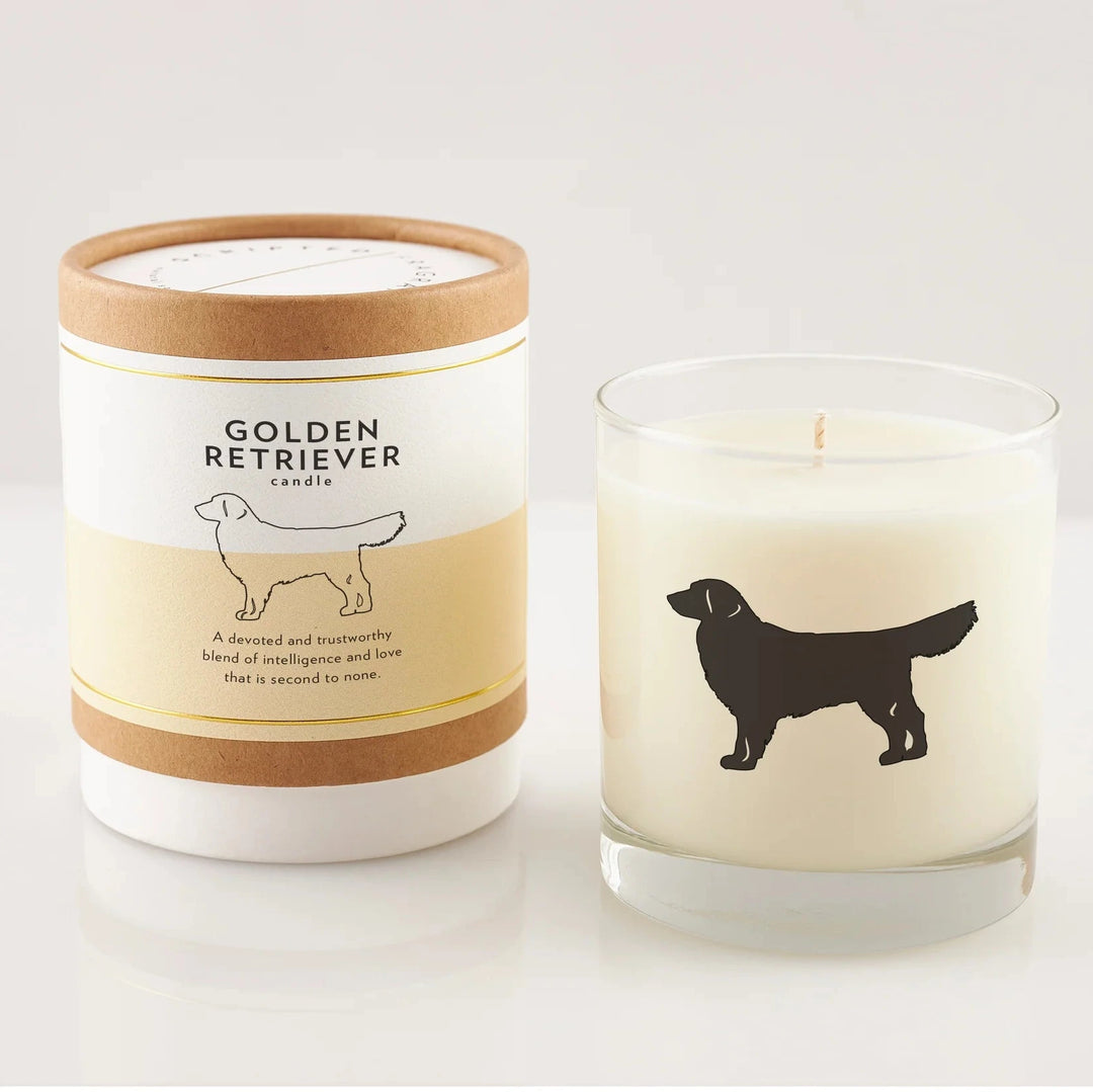 Candle with a Golden Retriever design and matching packaging on a white background