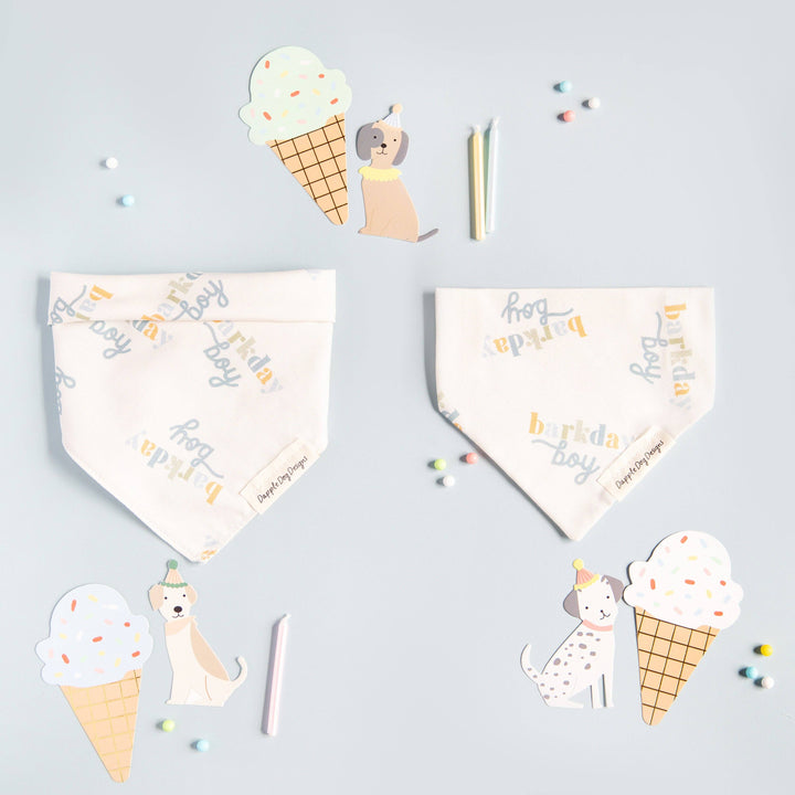 Dapple Dog Designs Barkday Boy dog bandanas displayed with birthday-themed props including ice cream cones and party details.
