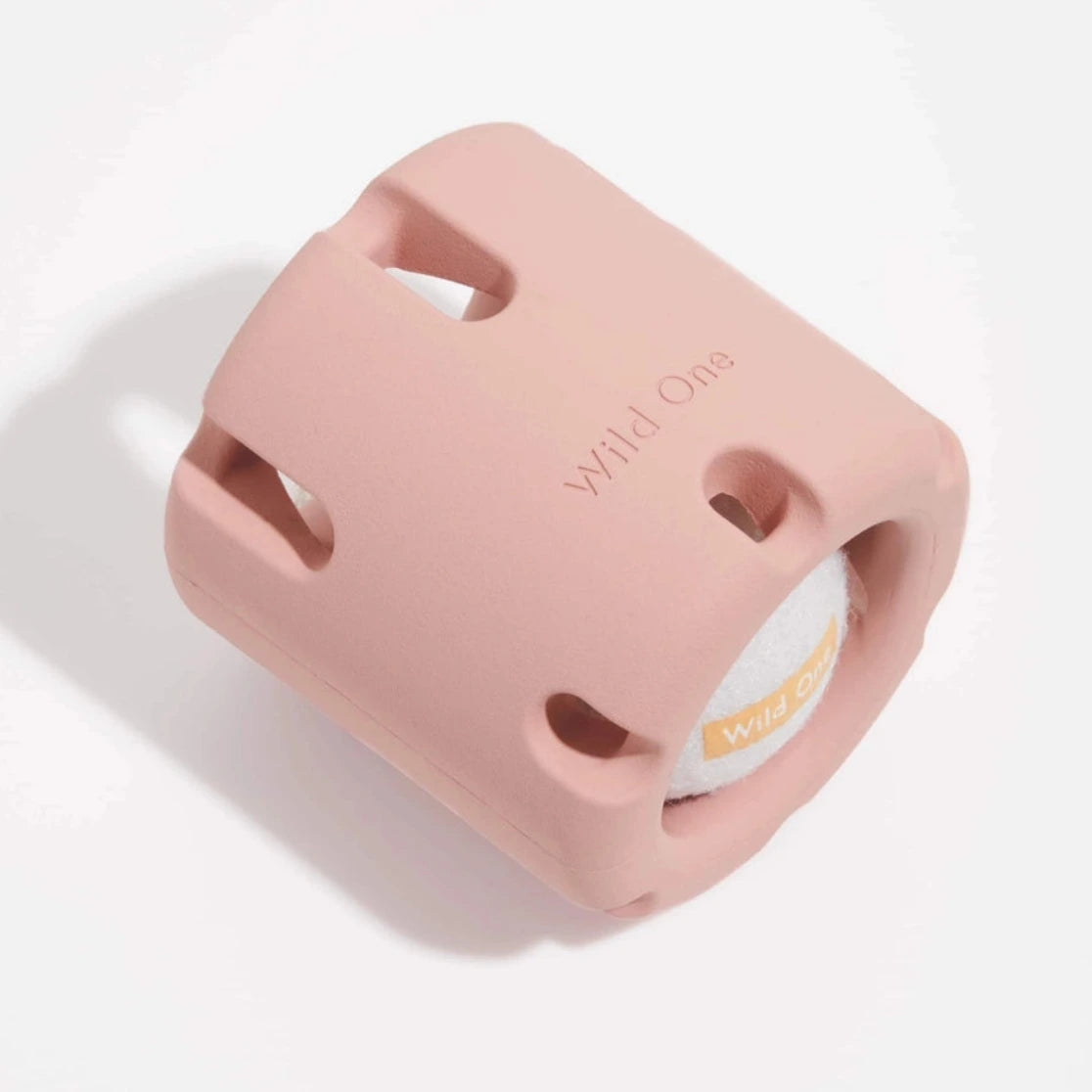 Tennis ball in pink tumbler for dog enrichment toy