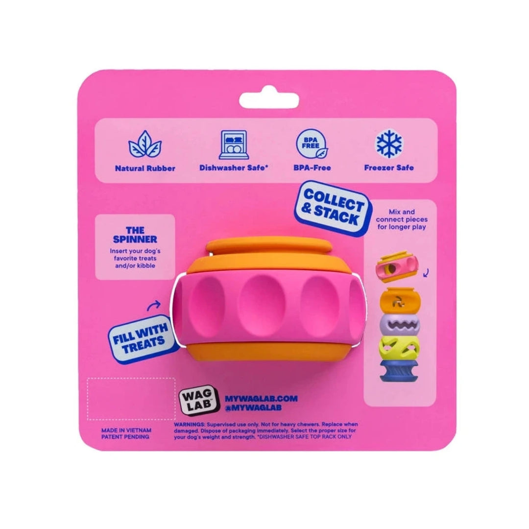 Pink packaging of a dog toy with text and graphics on a white background