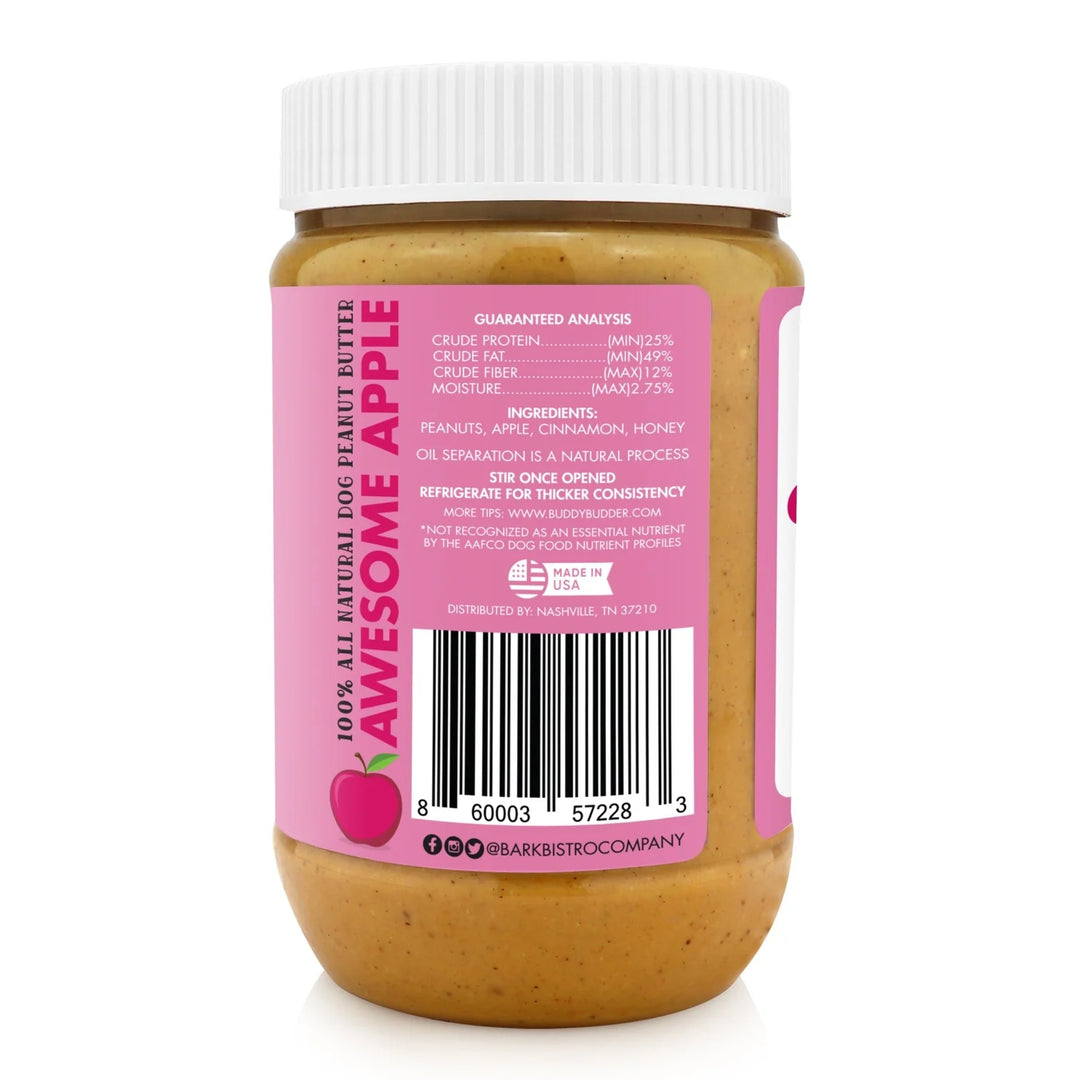 Jar of peanut butter with a pink label on a white background