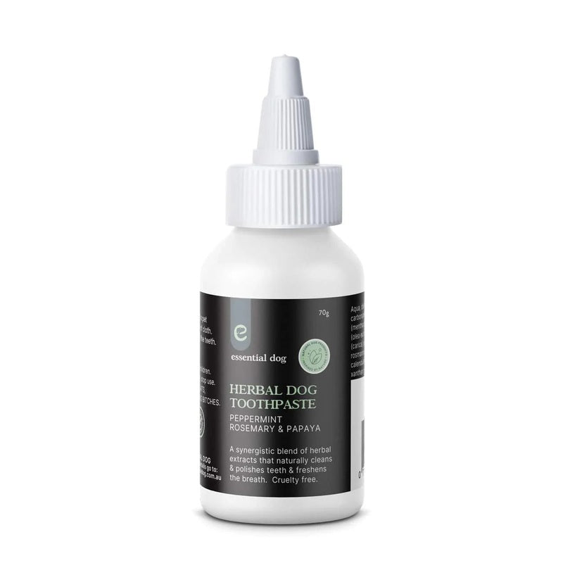 Bottle of essential dog herbal dog toothpaste on a white background