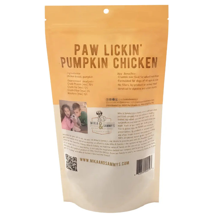 Dog food package labeled 'Paw Lickin' Pumpkin Chicken' with branding and website information.