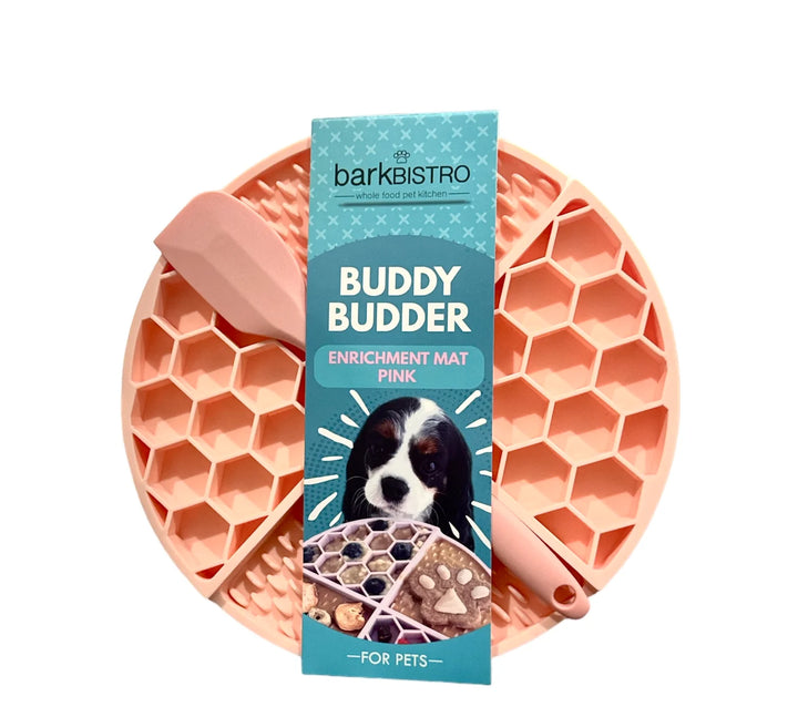Pink honeycomb enrichment mat with 'barkBISTRO' packaging on a white background
