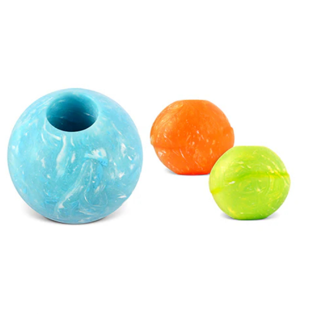 Three colorful zoomierex incrediballs on a white background