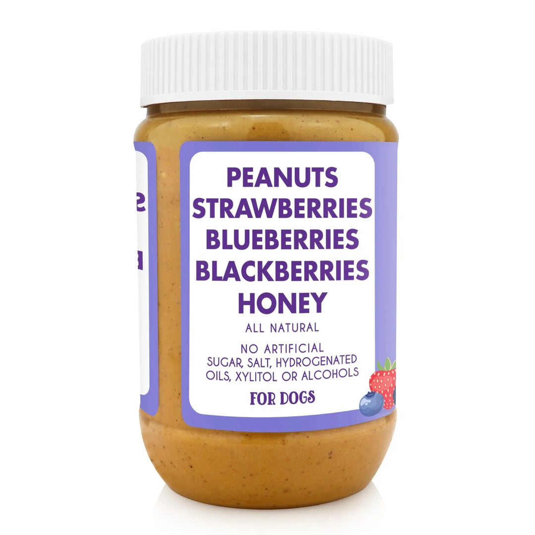 Jar of peanut butter with a label listing ingredients for dogs on a white background